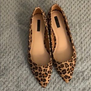 Pointed toe animal print flats